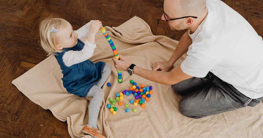 parent choosing toys for child development and emotional learning